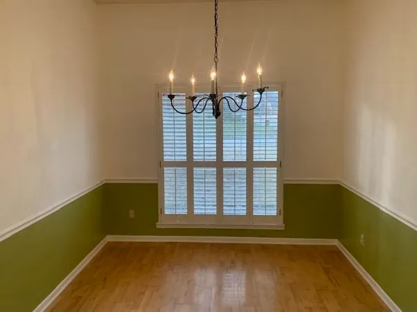 a kitchen with stainless steel appliances a sink stove and refrigerator