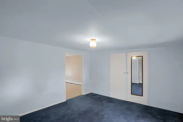 a view of a livingroom with a furniture window and natural light