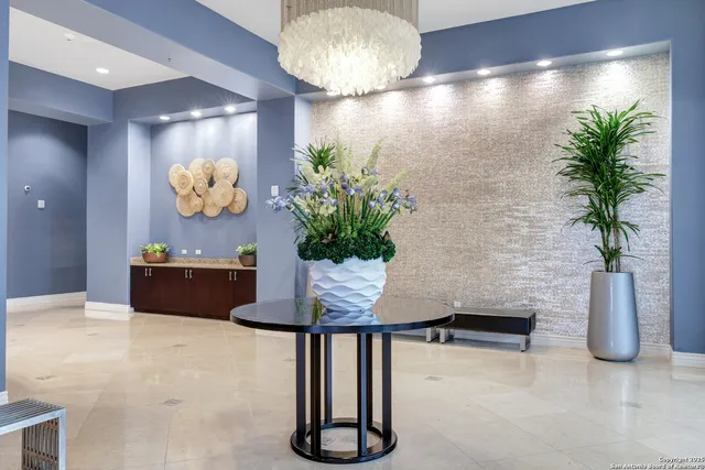 a view of lobby with a potted plant
