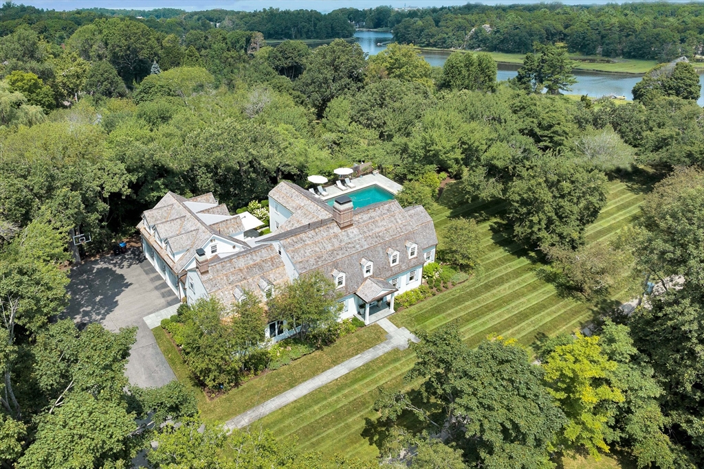 an aerial view of residential house with outdoor space