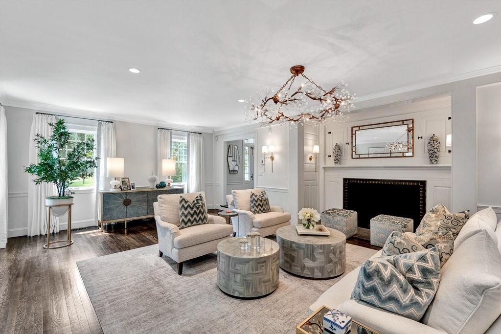 10 River Road Cohasset, MA 02025 - Photo 15 of 35 a living room with furniture and a fireplace
