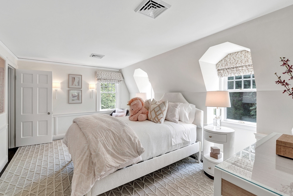 10 River Road Cohasset, MA 02025 - Photo 19 of 35 a bedroom with a bed and a window