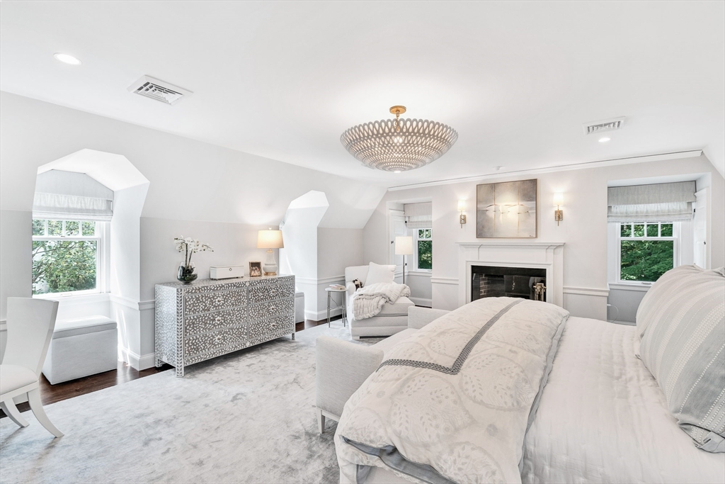 10 River Road Cohasset, MA 02025 - Photo 24 of 35 a living room with furniture and a fireplace