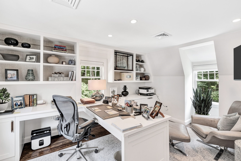 10 River Road Cohasset, MA 02025 - Photo 26 of 35 a view of a workspace with furniture and a potted plant