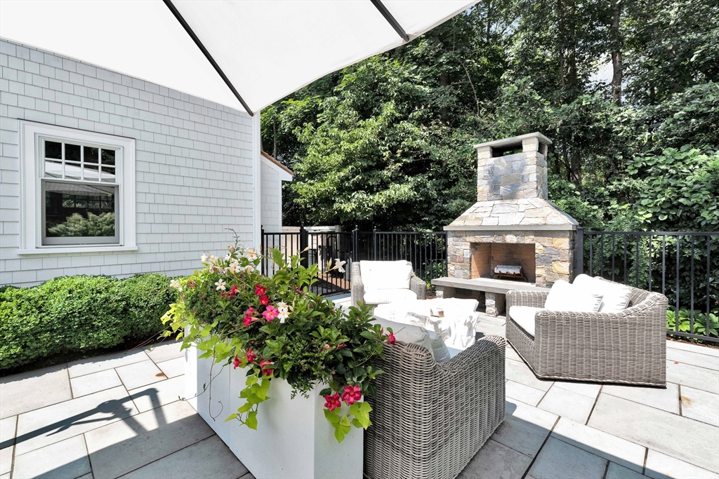 10 River Road Cohasset, MA 02025 - Photo 6 of 35 a front view of a house with patio