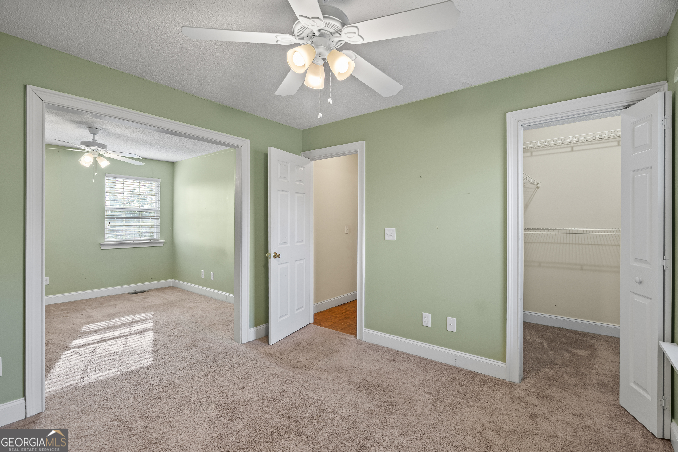 210 Blue Ridge Avenue Demorest, GA 30535 - Photo 18 of 74 an empty room with fan and entrance