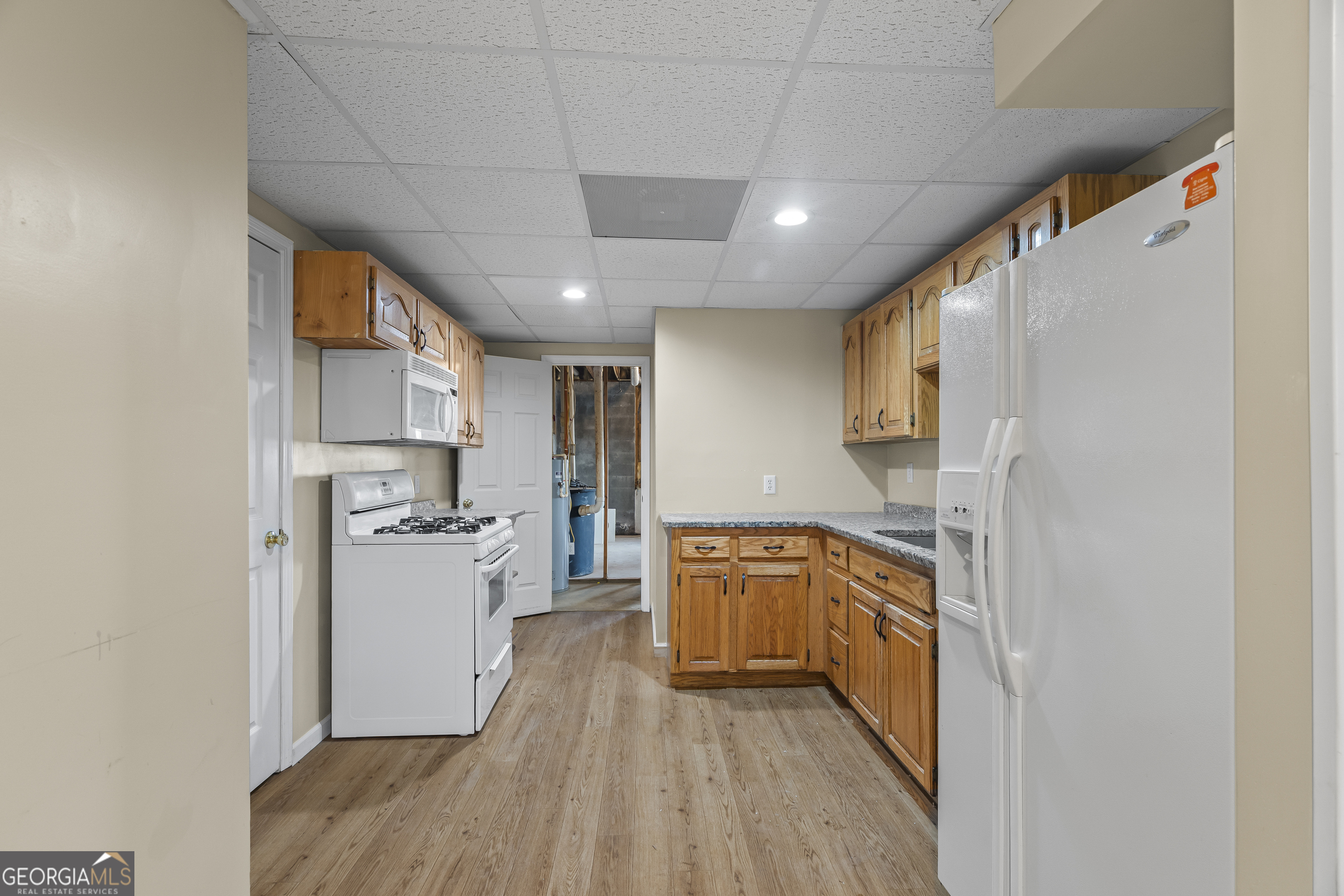 210 Blue Ridge Avenue Demorest, GA 30535 - Photo 40 of 74 a kitchen with stainless steel appliances a refrigerator and a stove top oven