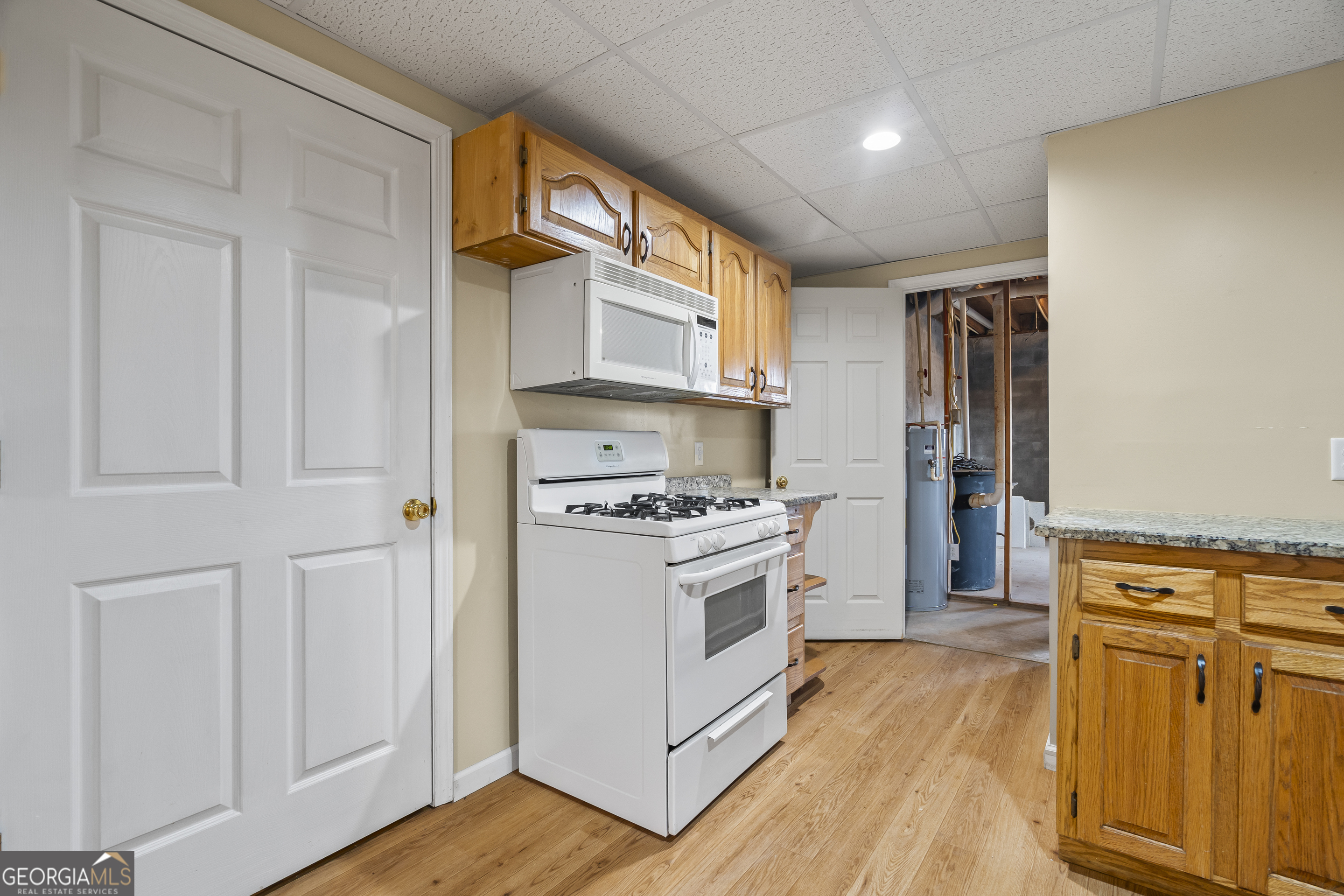 210 Blue Ridge Avenue Demorest, GA 30535 - Photo 42 of 74 a kitchen with stainless steel appliances granite countertop a stove and a refrigerator