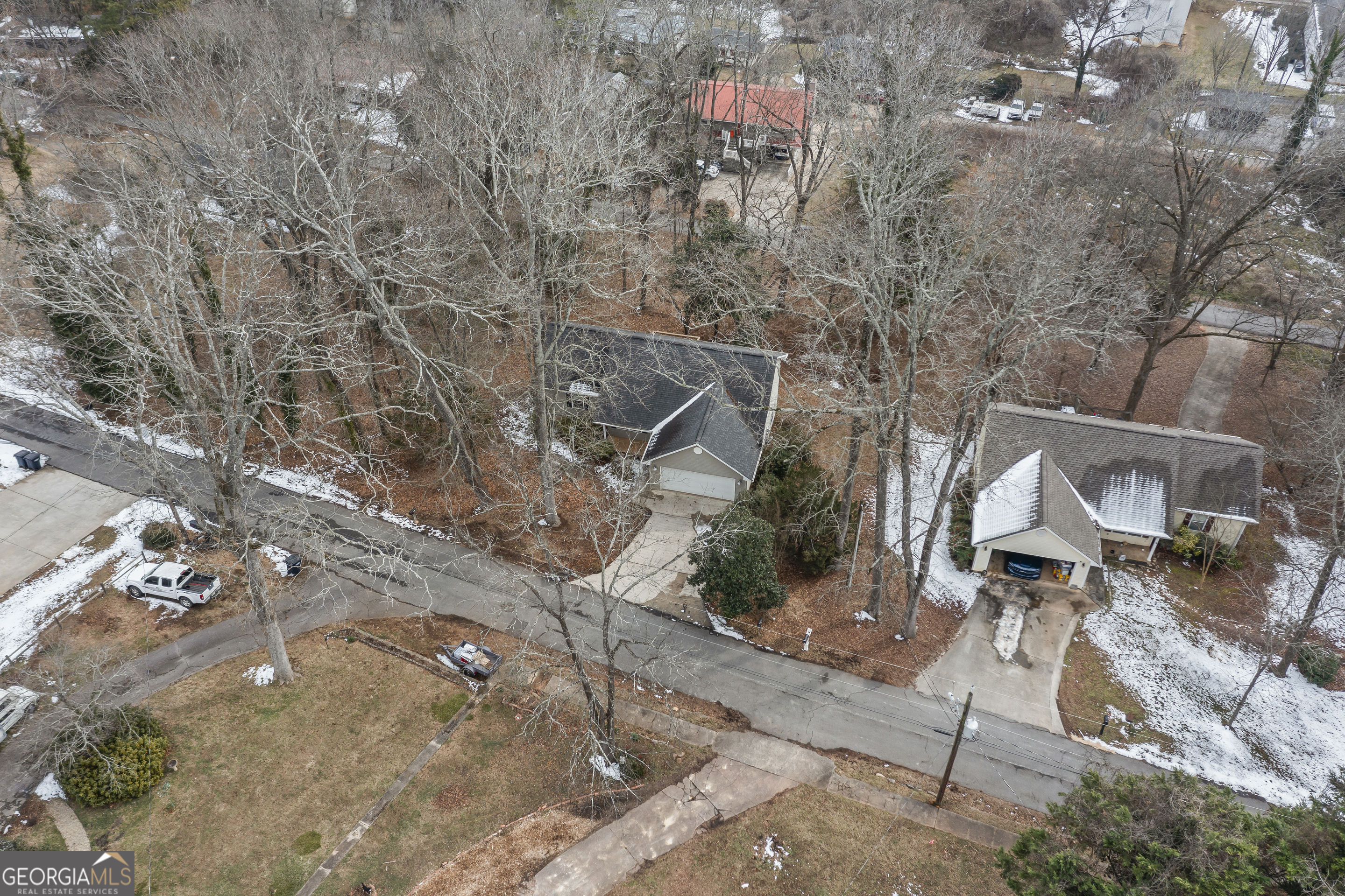 210 Blue Ridge Avenue Demorest, GA 30535 - Photo 60 of 74 a backyard of a house with table and chairs