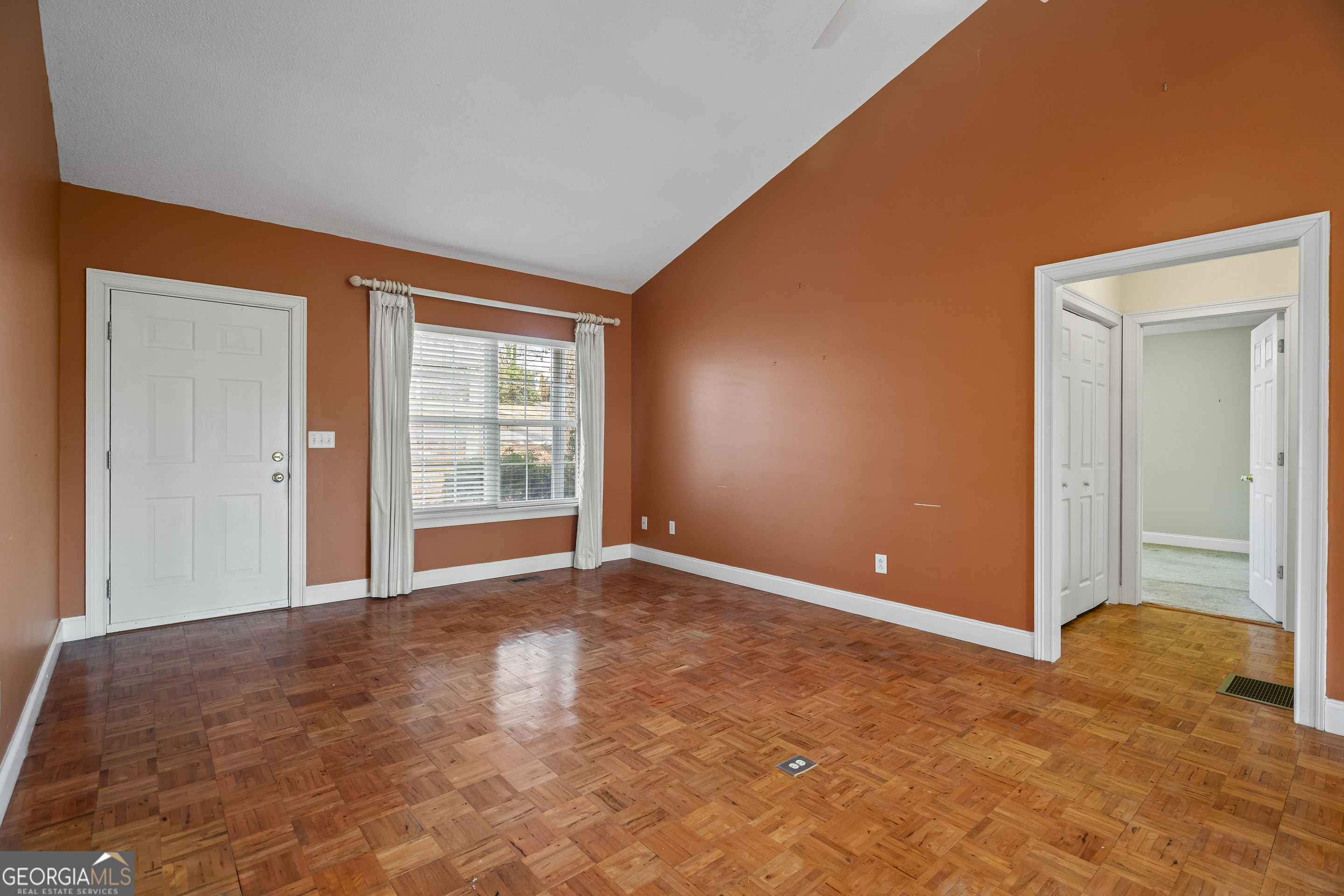 210 Blue Ridge Avenue Demorest, GA 30535 - Photo 7 of 74 a view of an empty room with a window