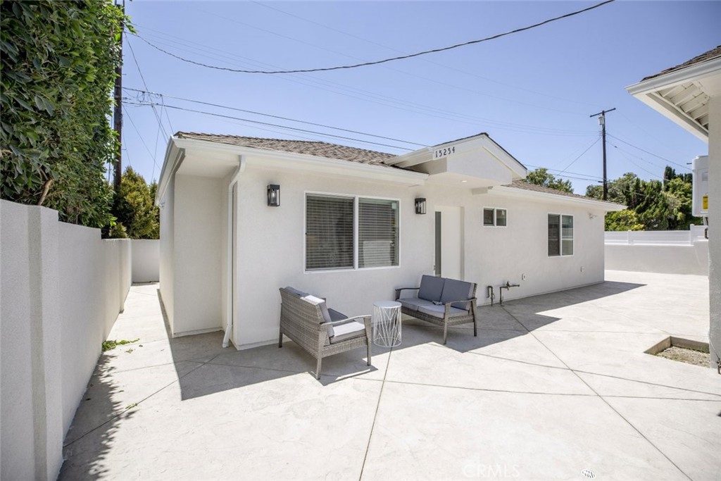 15254 Clymer Street Mission Hills, CA 91345 - Photo 24 of 26 a front view of a house with patio