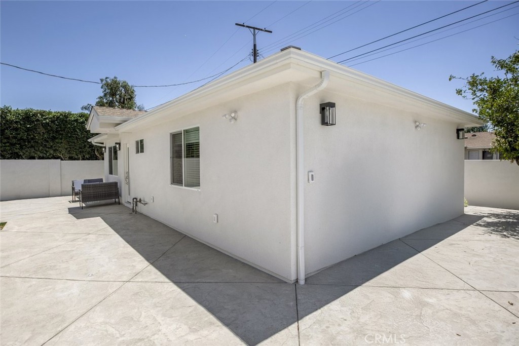 15254 Clymer Street Mission Hills, CA 91345 - Photo 25 of 26 a bathroom with a sink and mirror