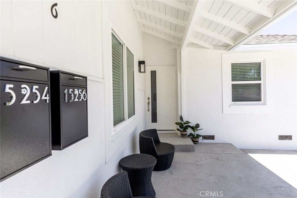 15254 Clymer Street Mission Hills, CA 91345 - Photo 3 of 26 a bathroom with a sink and a mirror
