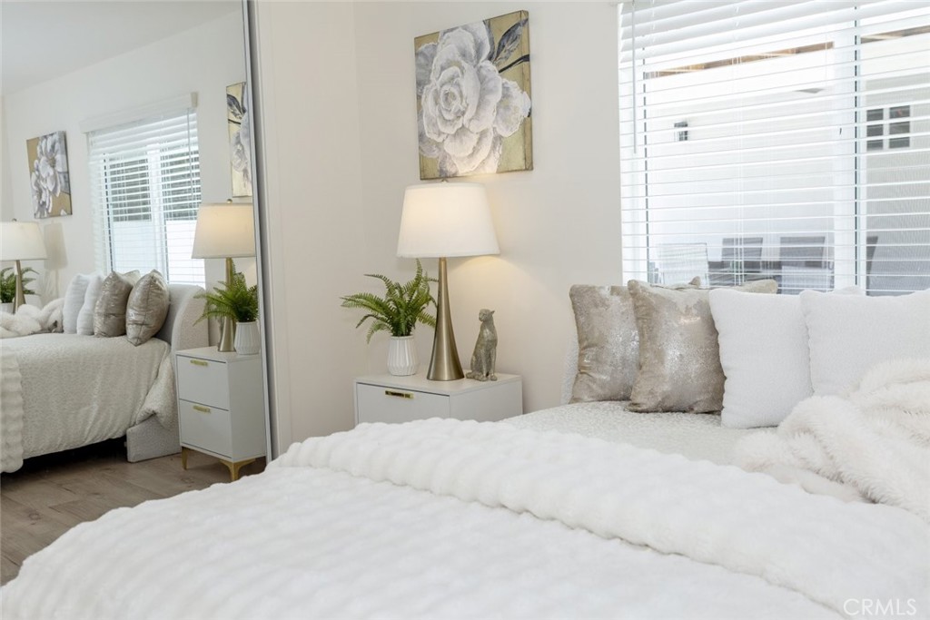 15254 Clymer Street Mission Hills, CA 91345 - Photo 10 of 26 a bedroom with a large bed and a window