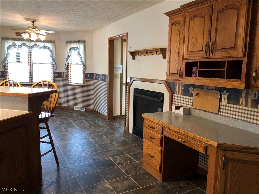 38570 Detroit Road Avon, OH 44011 - Photo 11 of 29 eating are in kitchen plus breakfast bar
