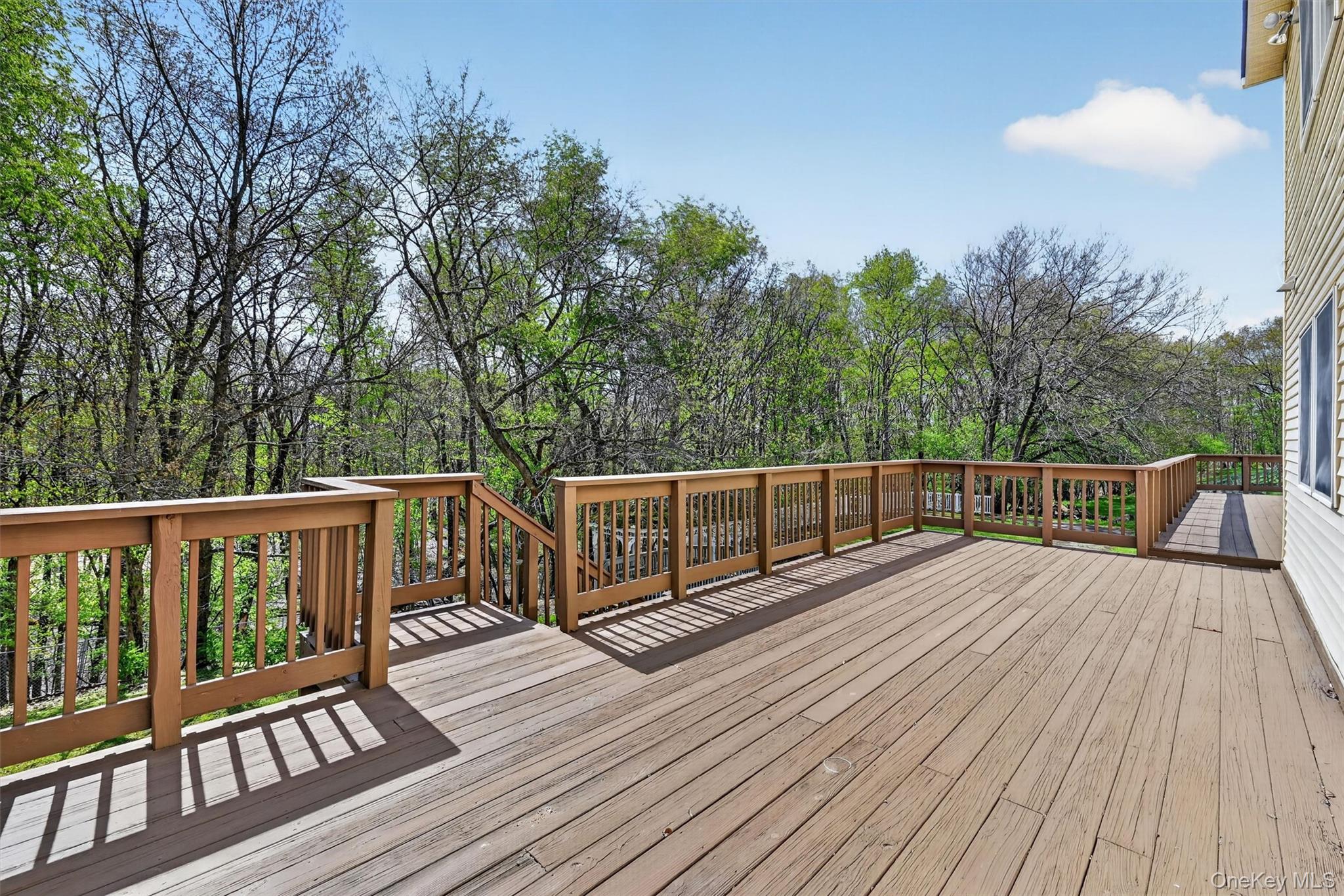 285 Hill Road Goshen, NY 10924 - Photo 31 of 49 The back deck is quite large and will make a great outdoor living space