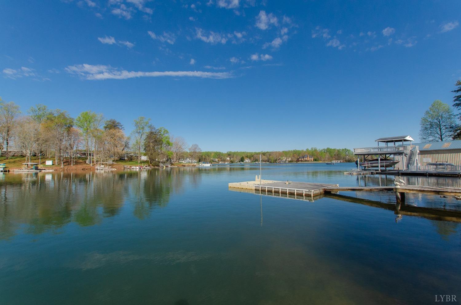 309 Lakeside Road Penhook, VA 24137 - Photo 2 of 61 a view of a lake with houses