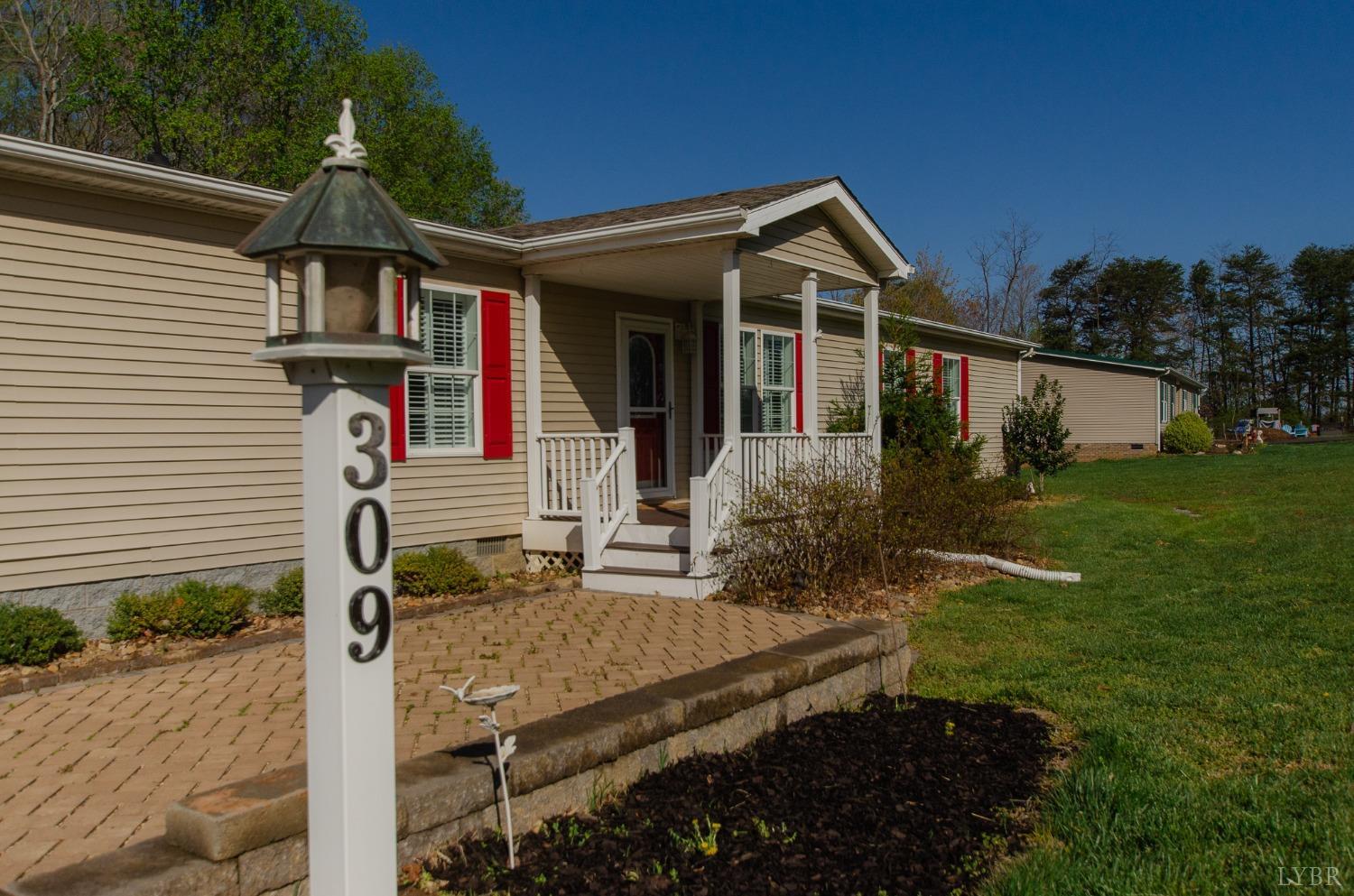 309 Lakeside Road Penhook, VA 24137 - Photo 43 of 61 a front view of house with yard