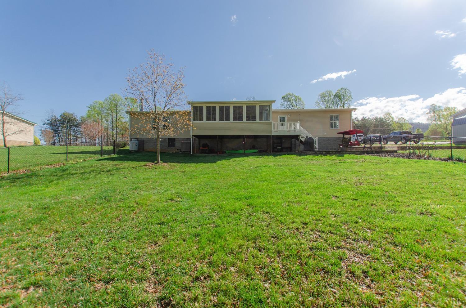 309 Lakeside Road Penhook, VA 24137 - Photo 49 of 61 a view of a house with a yard