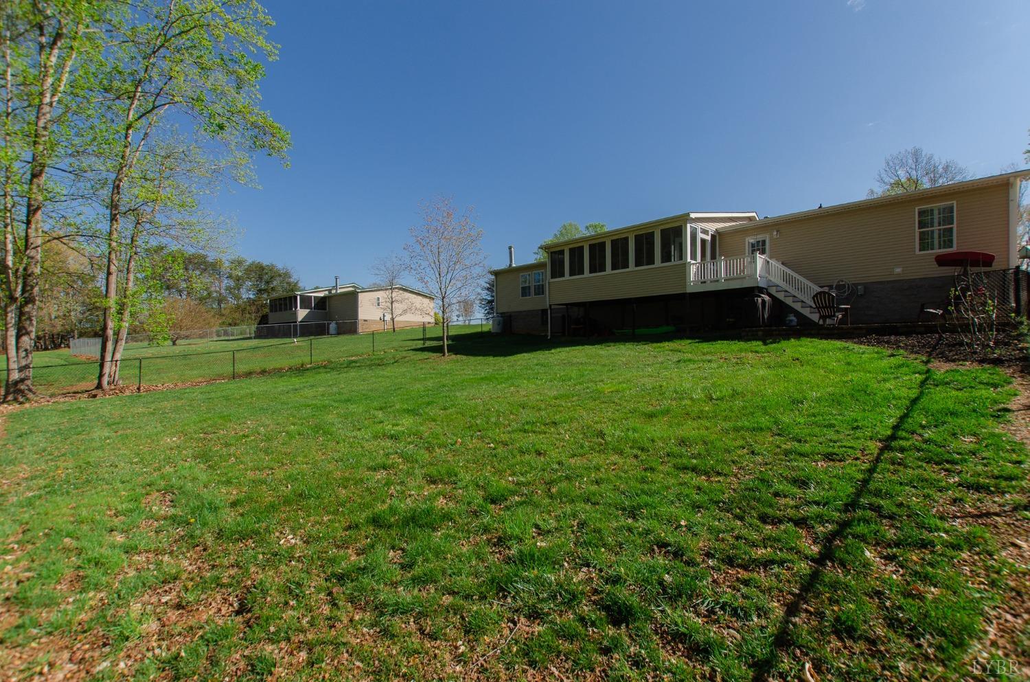 309 Lakeside Road Penhook, VA 24137 - Photo 50 of 61 a view of a house with a yard