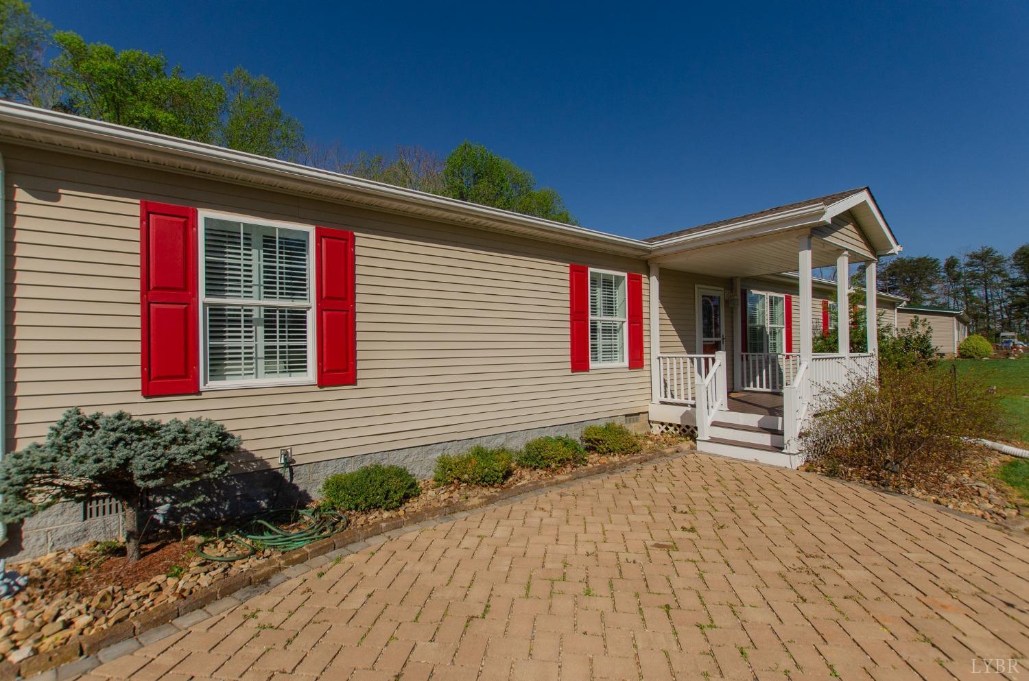 309 Lakeside Road Penhook, VA 24137 - Photo 56 of 61 a front view of a house with garden