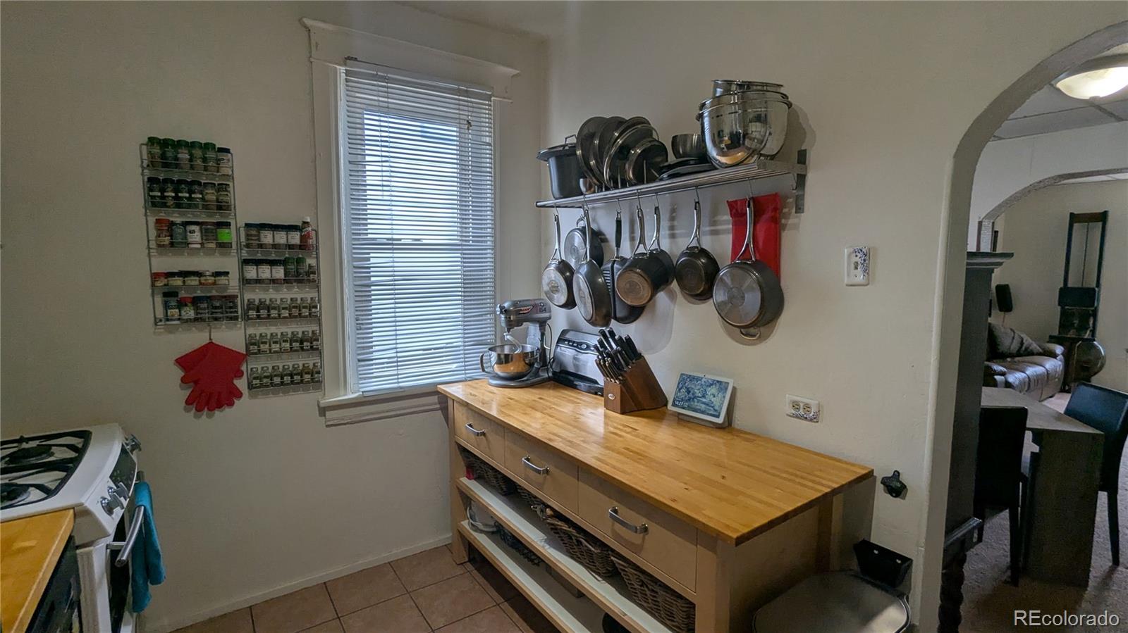 3924 Jason Street Denver, CO 80211 - Photo 17 of 26 a room with storage and utility