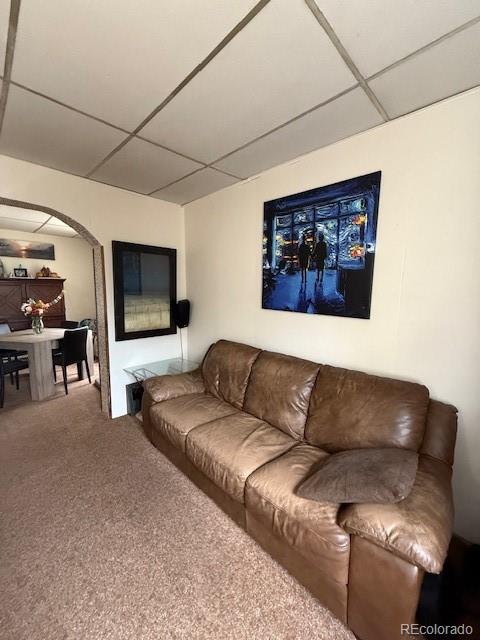 3924 Jason Street Denver, CO 80211 - Photo 7 of 26 a living room with furniture and a flat screen tv