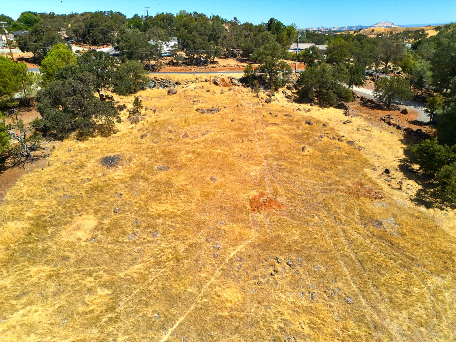 7033 Cane Lane Valley Springs, CA 95252 - Photo 11 of 14 a view of a yard with wooden fence