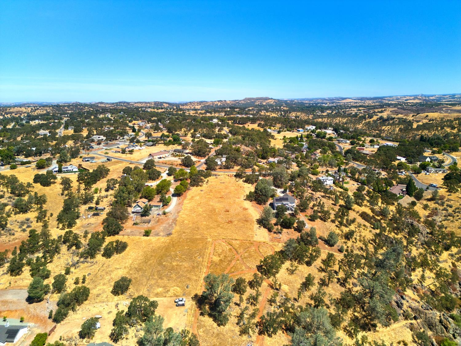 7033 Cane Lane Valley Springs, CA 95252 - Photo 13 of 14 an aerial view of residential space with parking space