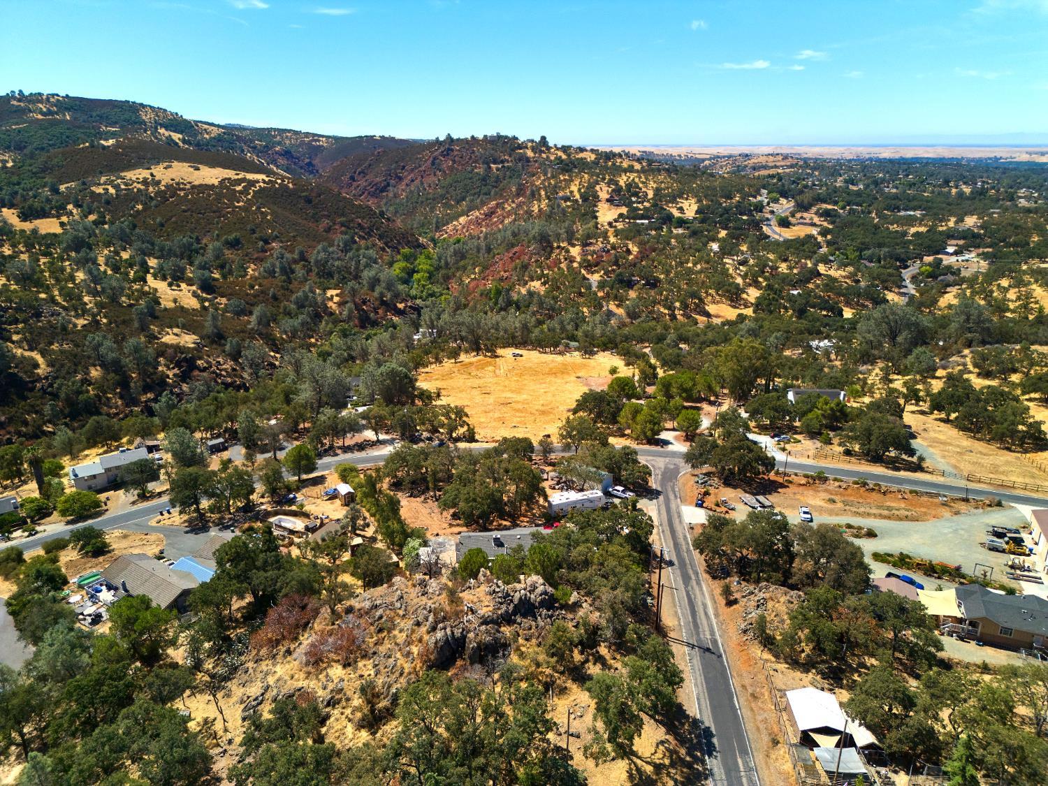 7033 Cane Lane Valley Springs, CA 95252 - Photo 9 of 14 an aerial view of residential houses with city view