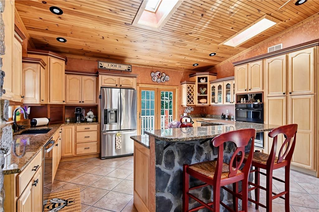 2516 Clayton Road Beaver Falls, PA 15010 - Photo 6 of 24 Side view of Kitchen from French Doors