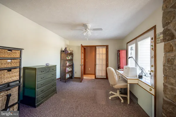 a bathroom with a toilet and a sink