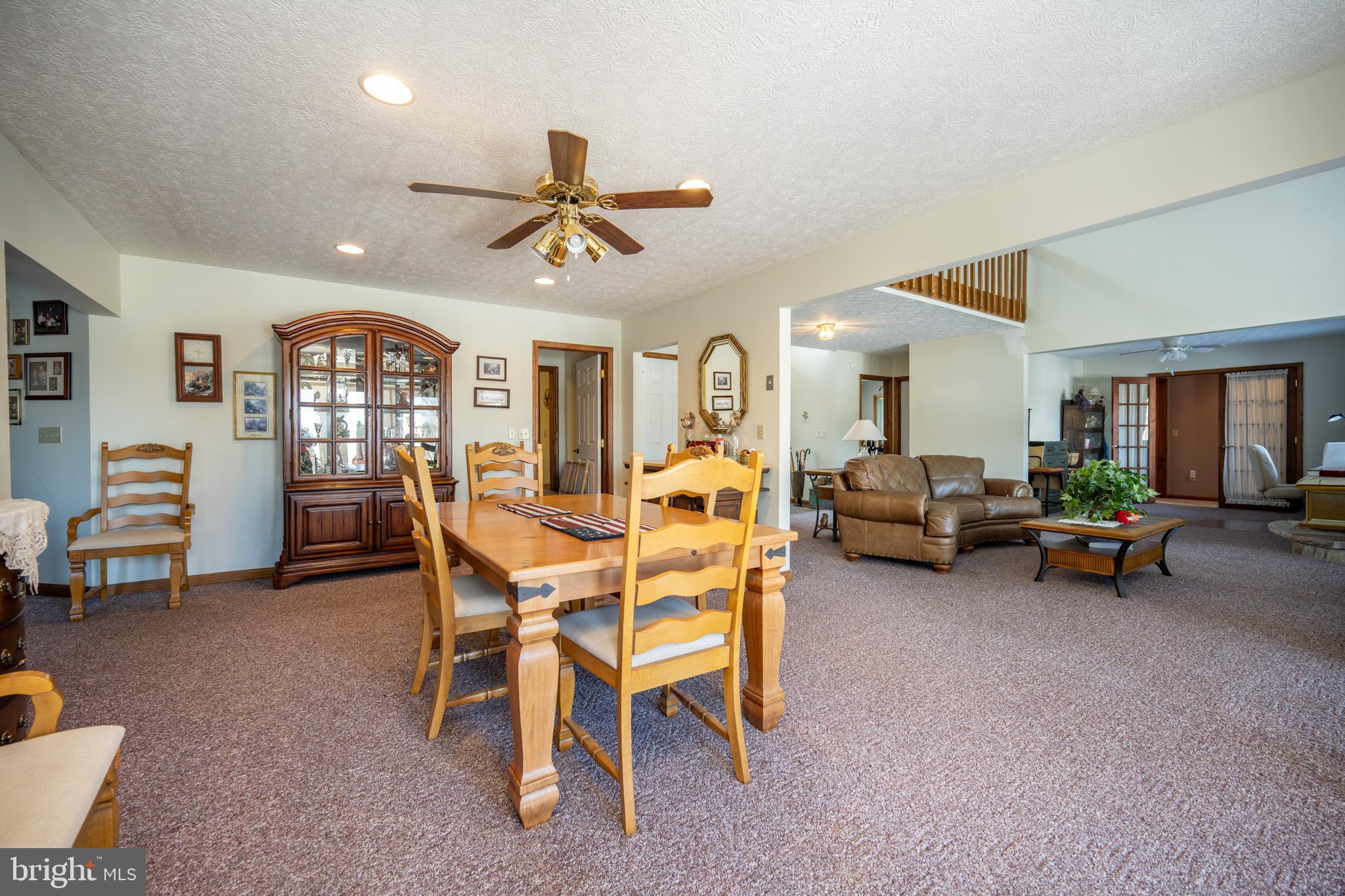 815 Chadderton School Road Oakland, MD 21550 - Photo 27 of 110 a living room with furniture and a wooden floor