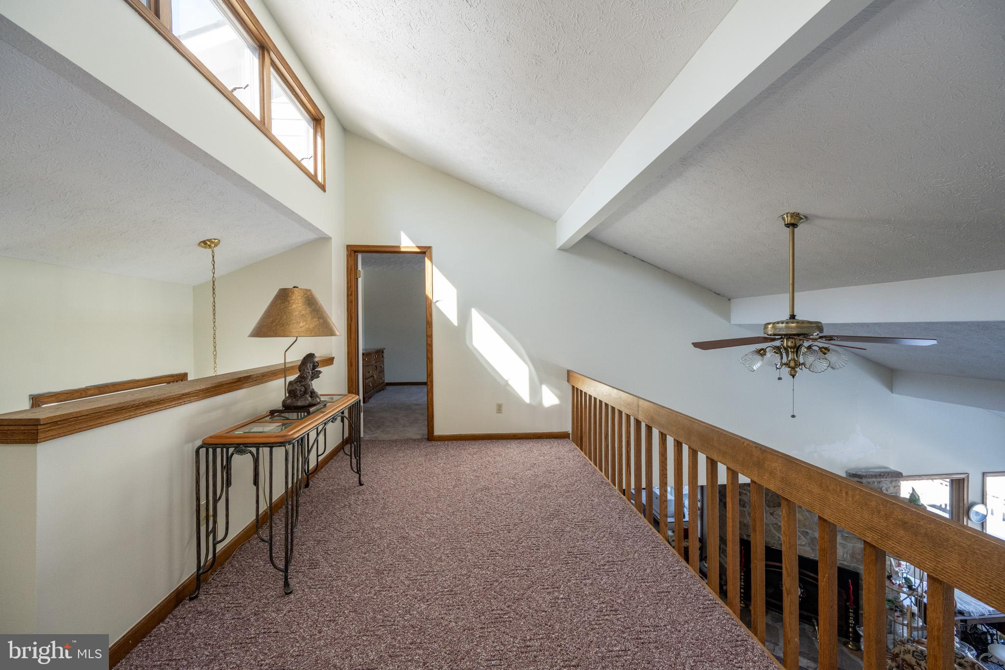 815 Chadderton School Road Oakland, MD 21550 - Photo 53 of 110 a view of an entryway wooden floor and windows