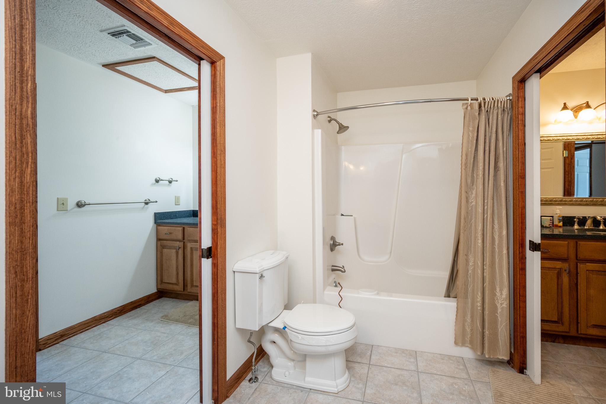 815 Chadderton School Road Oakland, MD 21550 - Photo 68 of 110 a bathroom with a toilet and a shower