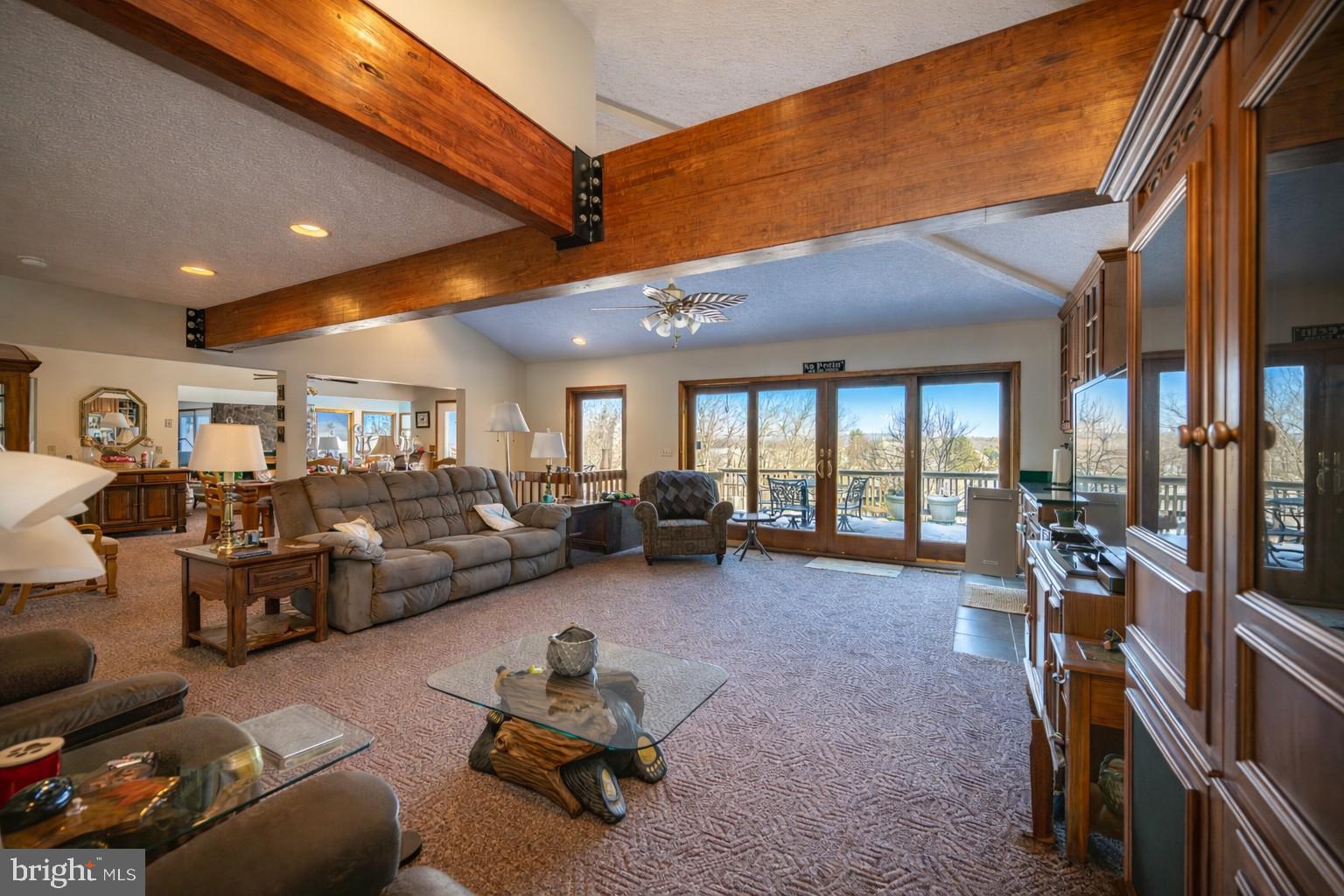 815 Chadderton School Road Oakland, MD 21550 - Photo 7 of 110 a living room with lots of furniture and a large window