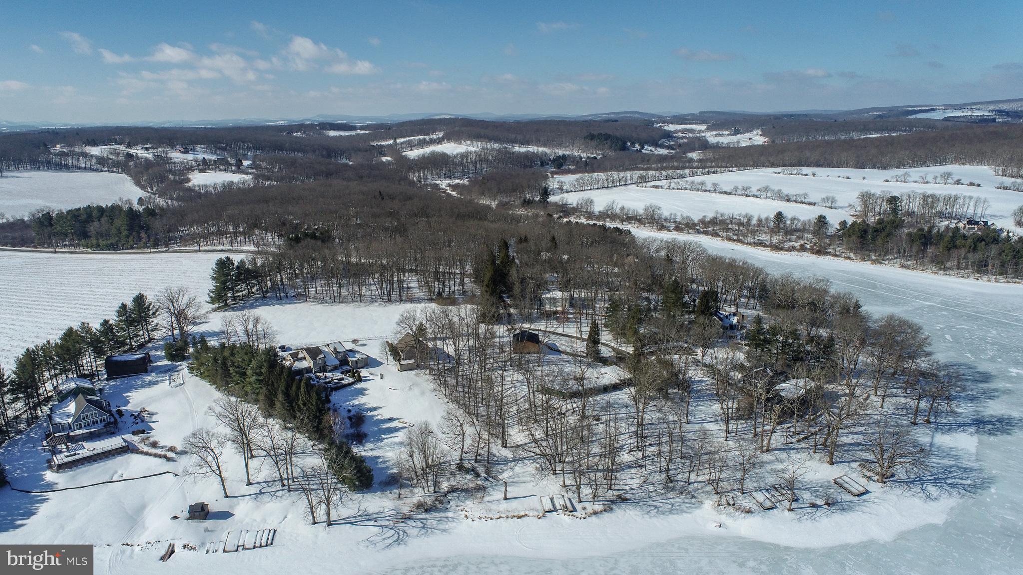 815 Chadderton School Road Oakland, MD 21550 - Photo 91 of 110 a view of a lake with a yard