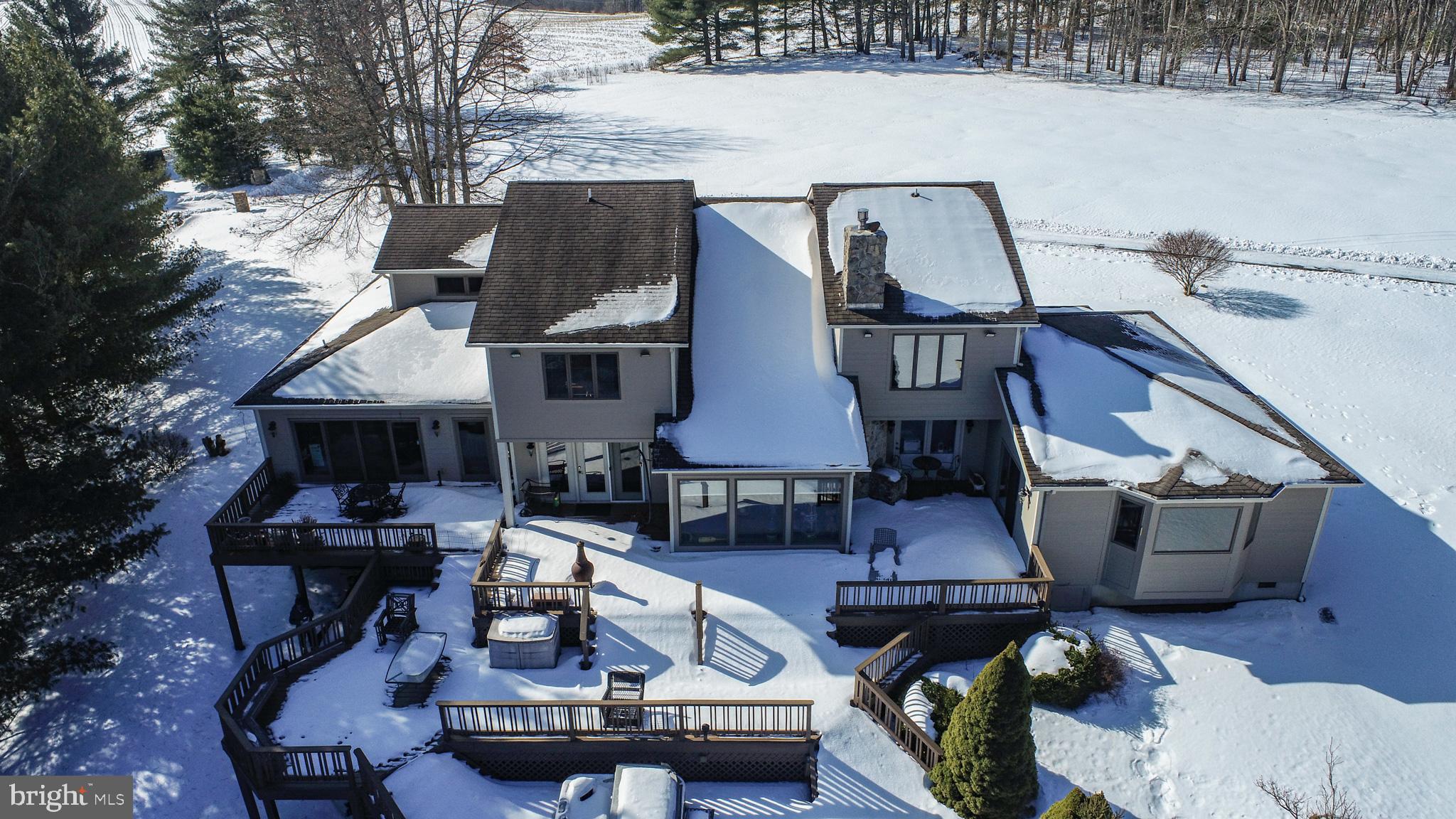 815 Chadderton School Road Oakland, MD 21550 - Photo 96 of 110 a front view of a house with sitting area