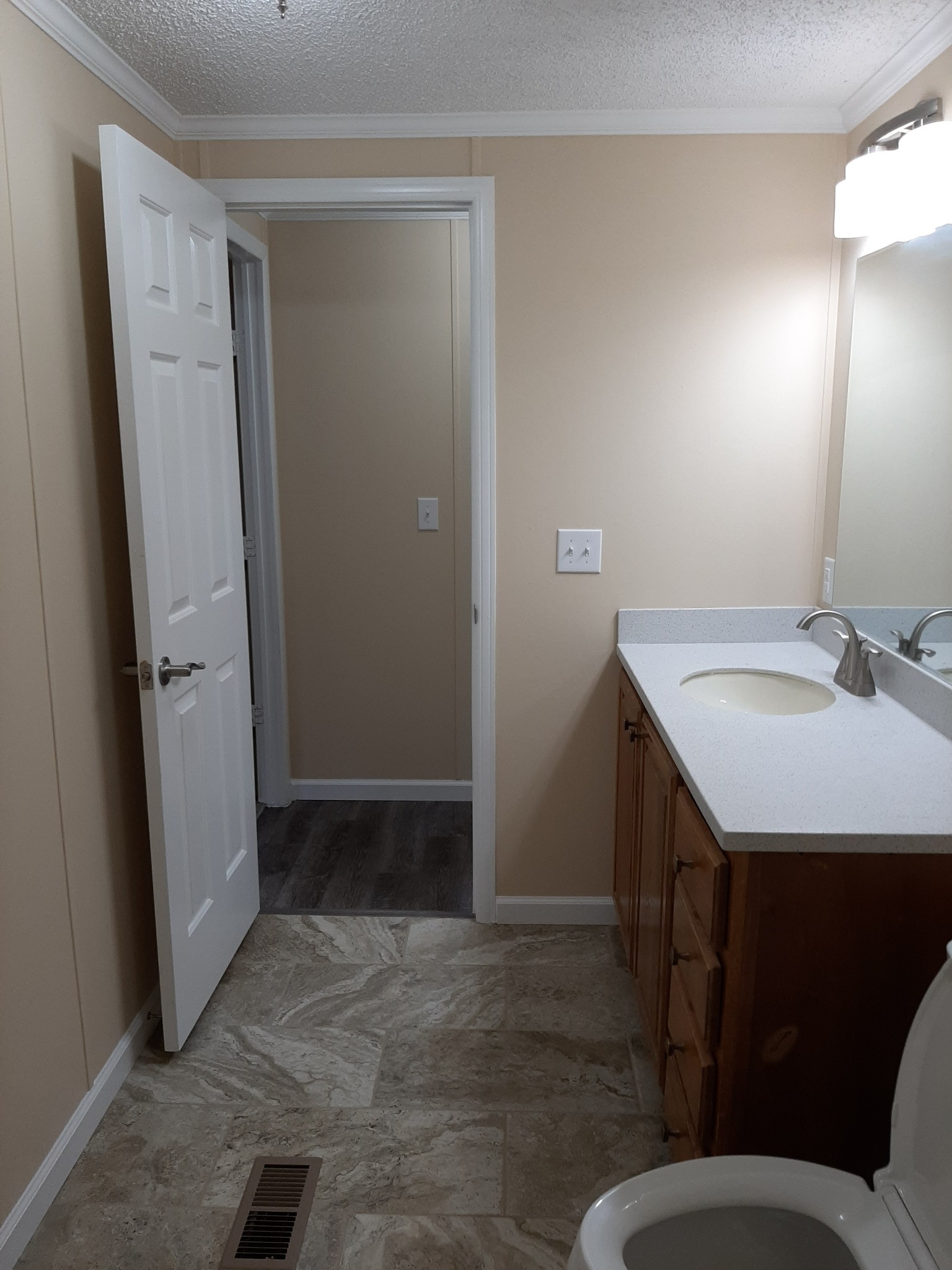 4354 Cainsville Road Lebanon, TN 37090 - Photo 19 of 26 a bathroom with a sink and a mirror