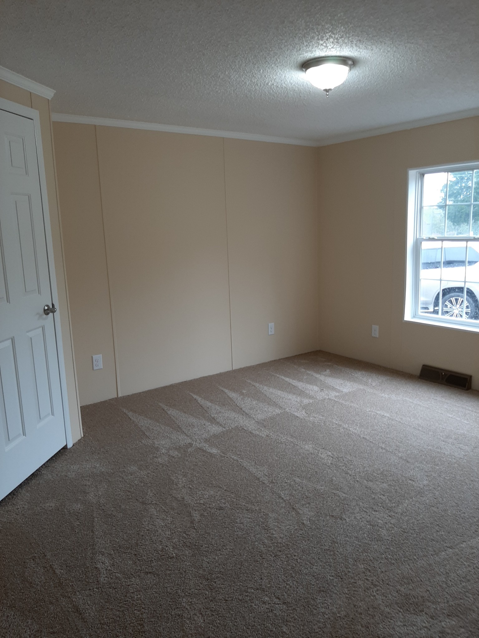 4354 Cainsville Road Lebanon, TN 37090 - Photo 23 of 26 an empty room with a empty space and windows