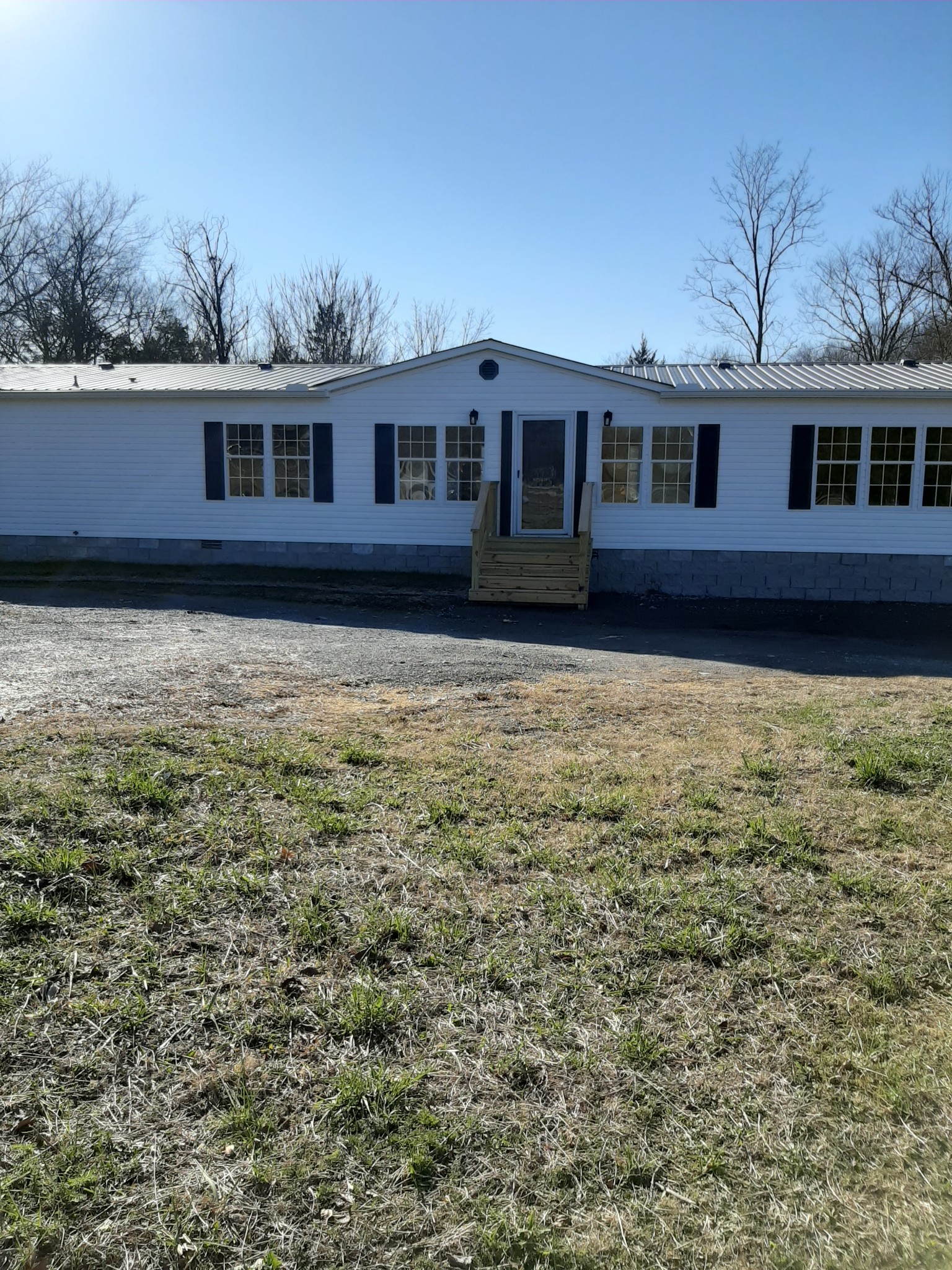 4354 Cainsville Road Lebanon, TN 37090 - Photo 25 of 26 a front view of a house with garden