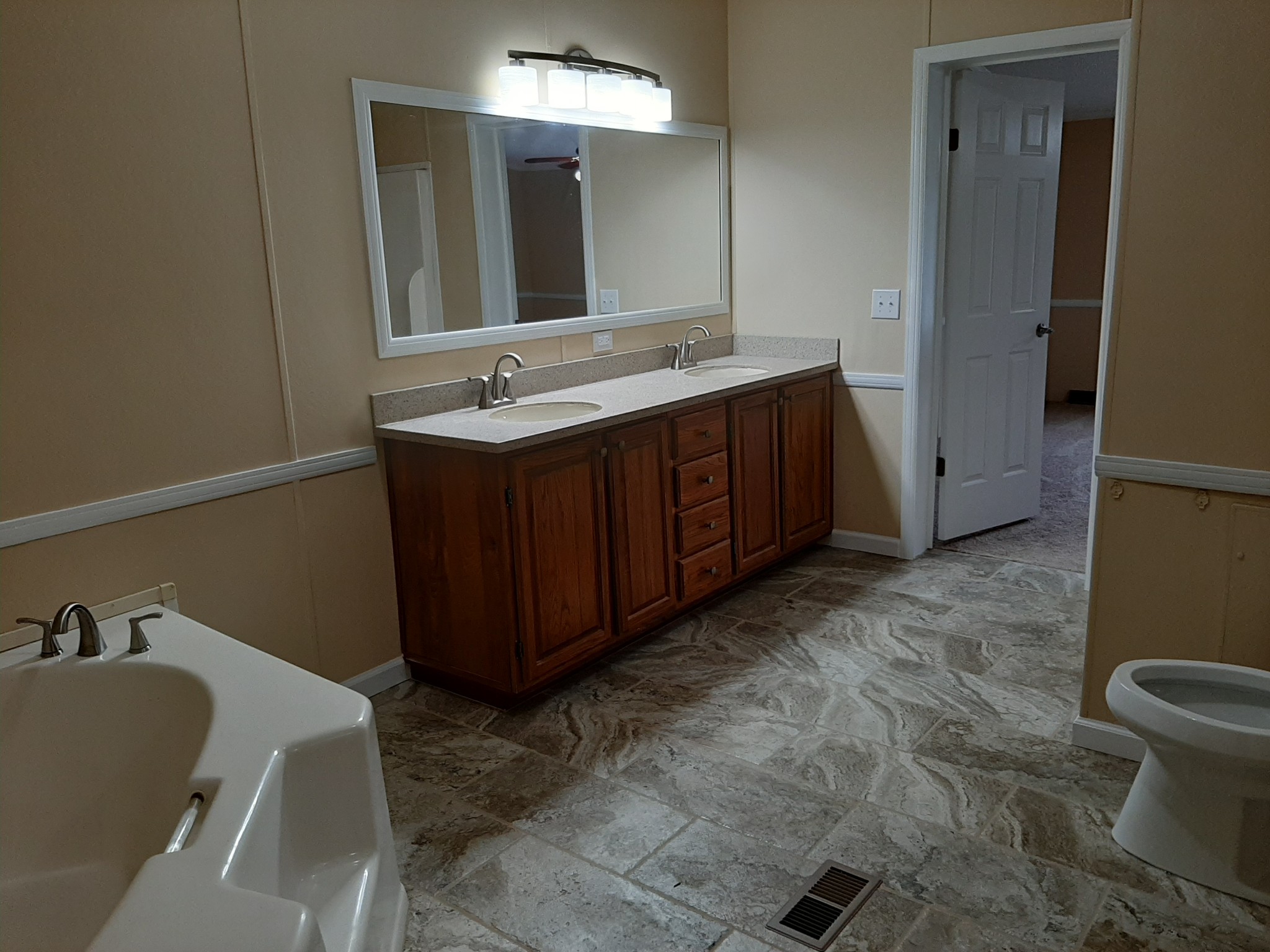 4354 Cainsville Road Lebanon, TN 37090 - Photo 4 of 26 a bathroom with a granite countertop sink and a mirror