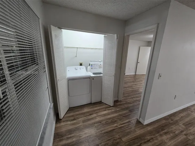 a view of a bathroom from a hallway