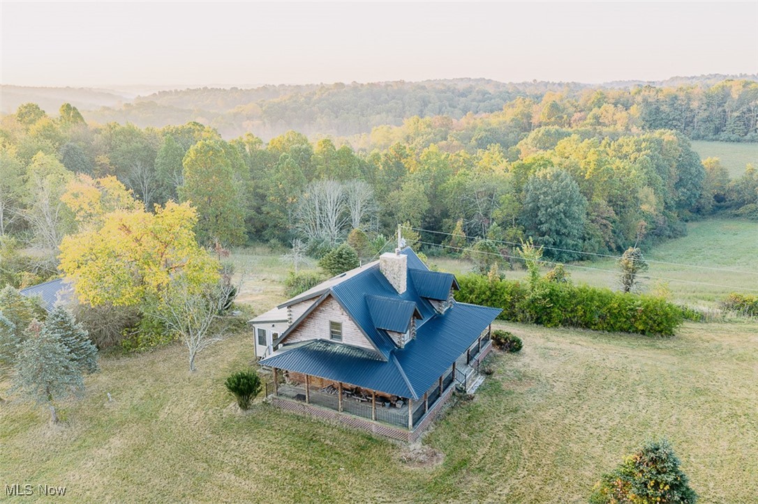 5991 Sandy Ridge Road Southeast Tippecanoe, OH 44699 - Photo 3 of 34 View from above of property with a forest
