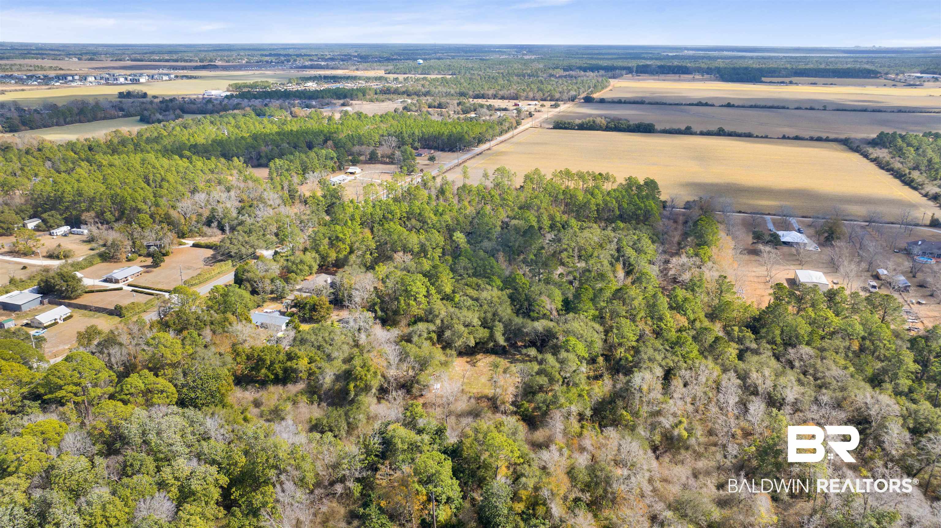 20568 Keller Road Foley, AL 36535 - Photo 5 of 13 Aerial view of sparsely populated area with a forest