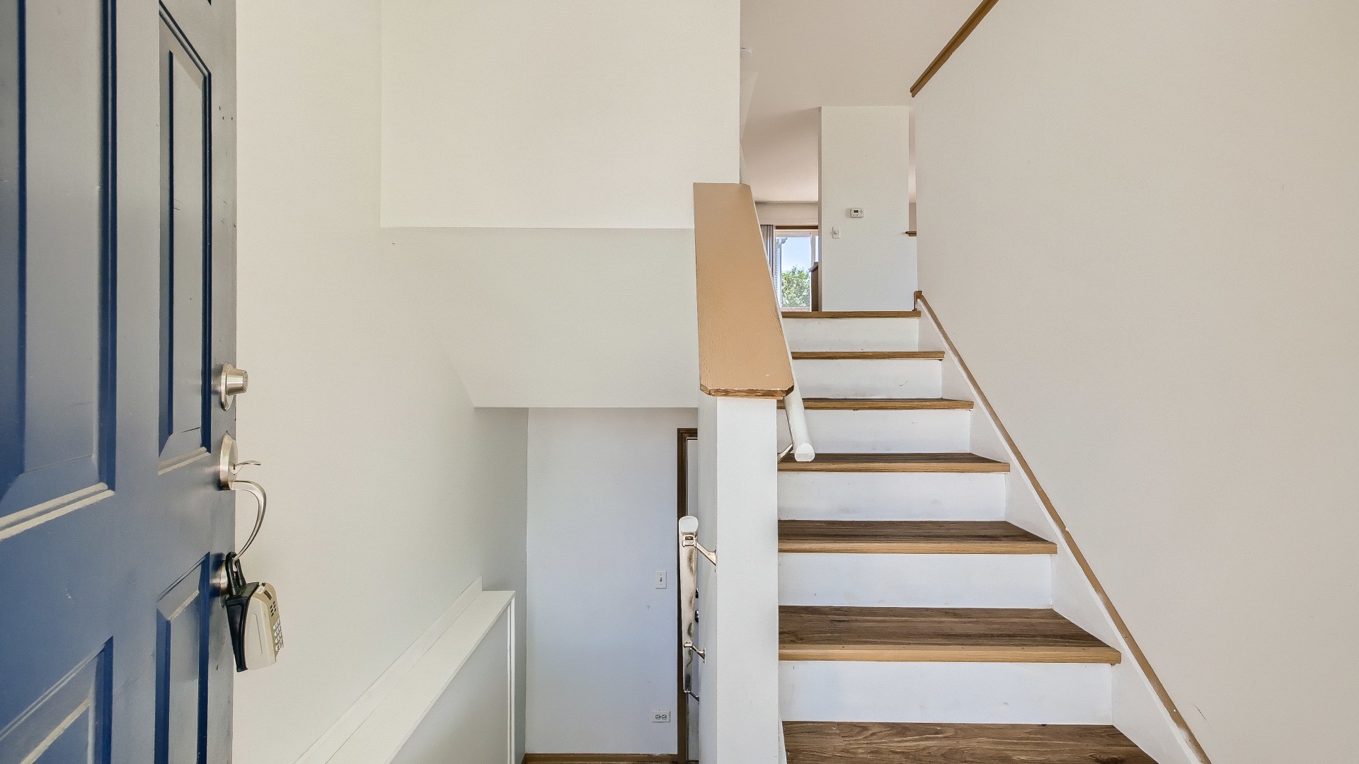 34337 North Barberry Road Round Lake Beach, IL 60073 - Photo 11 of 15 a view of entryway and hall with wooden floor
