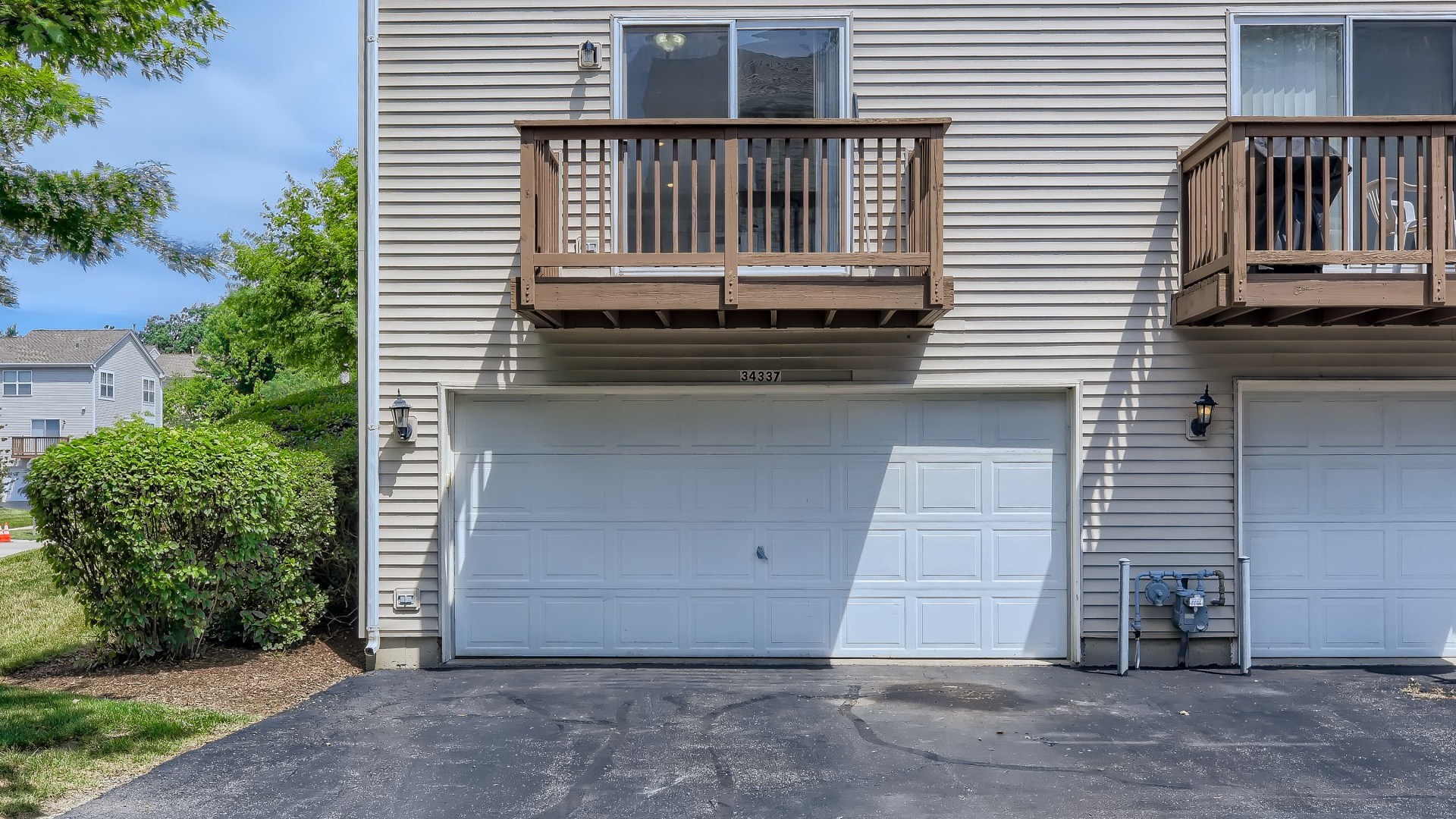 34337 North Barberry Road Round Lake Beach, IL 60073 - Photo 15 of 15 a front view of a house with a door