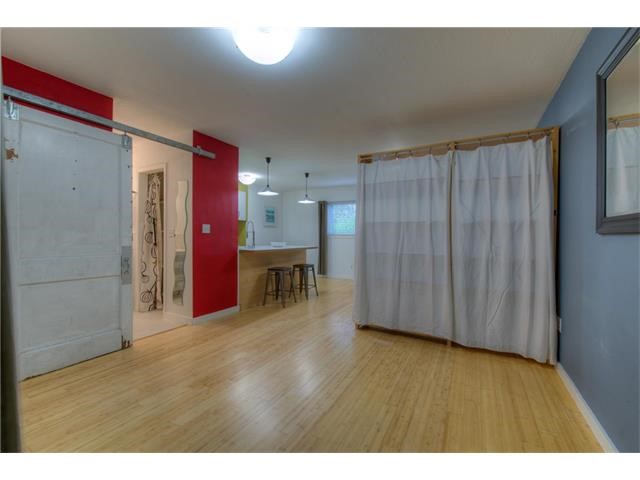 304 East 33rd Street, Unit 2 Austin, TX 78705 - Photo 5 of 12 a view of kitchen with furniture and wooden floor