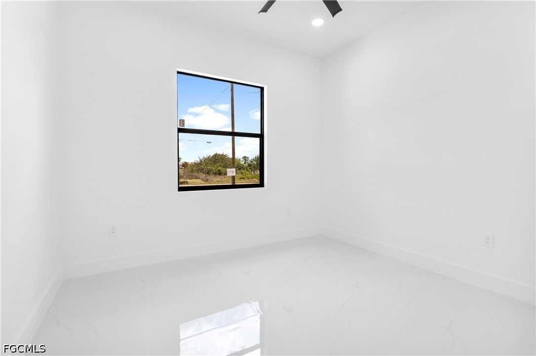 3004 South Tulip Road LaBelle, FL 33935 - Photo 19 of 24 a view of an empty room with a window