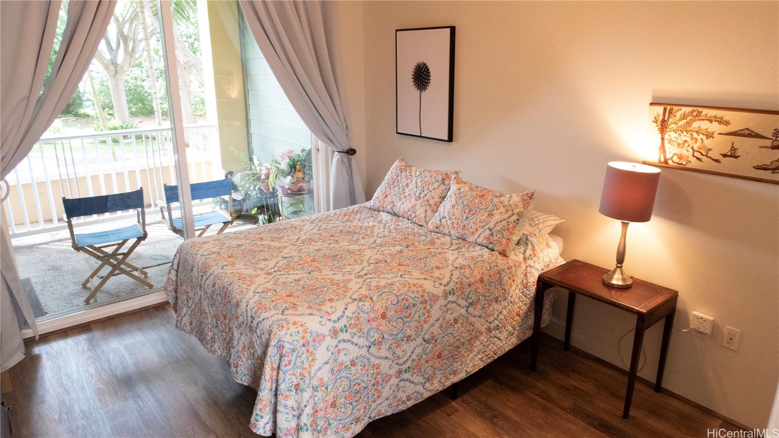 520 Lunalilo Home Road, Unit 7107 Honolulu, HI 96825 - Photo 14 of 21 a bed sitting in a bedroom next to a window